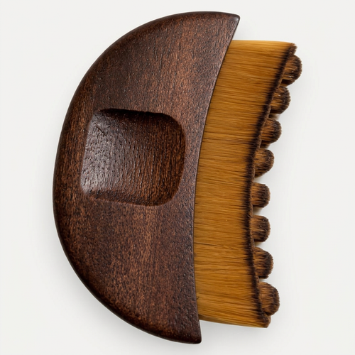 Square close-up of wooden face brush