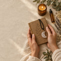 Morning ritual — journal, candle and quartz (placeholder lifestyle image)